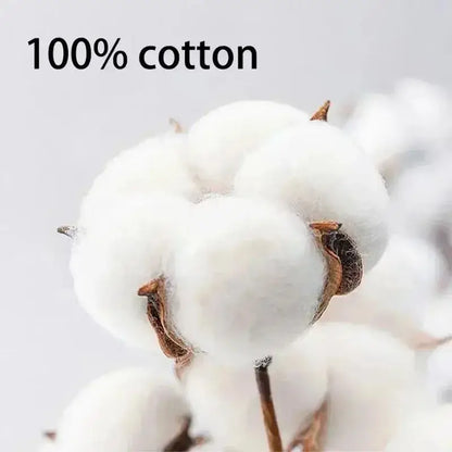 Plush white cotton bolls with brown stems highlighting soft material of solo leveling sung jin-woo loose fit oversized t-shirt