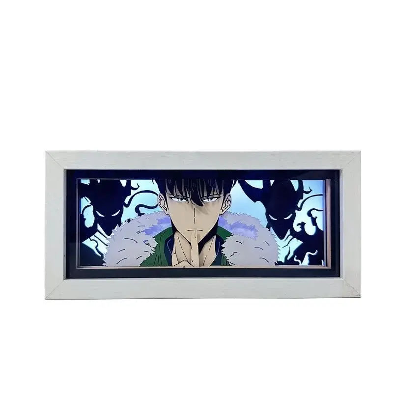 White-framed solo leveling sung jin-woo paper cut shadow box led lamp featuring character in green with shadowy figures behind him