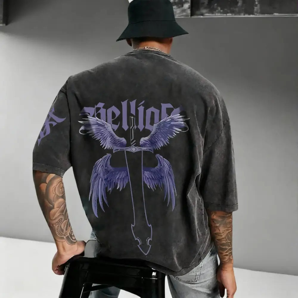 Black oversized cotton t-shirt with a purple winged sword graphic and vintage washed solo leveling sung design