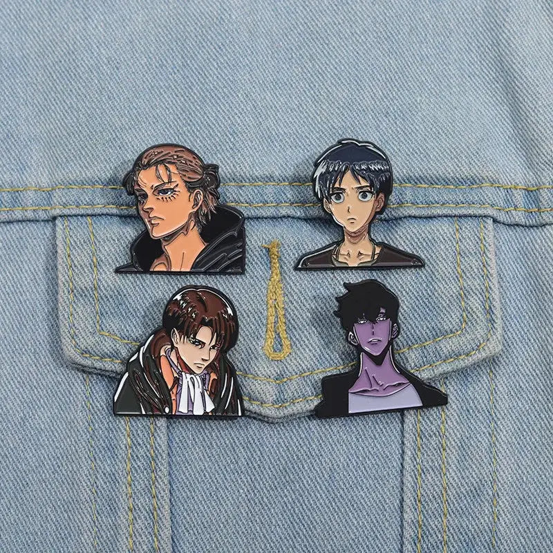 Four solo leveling sung jinwoo anime character enamel pins with detailed illustrations on a denim jacket pocket