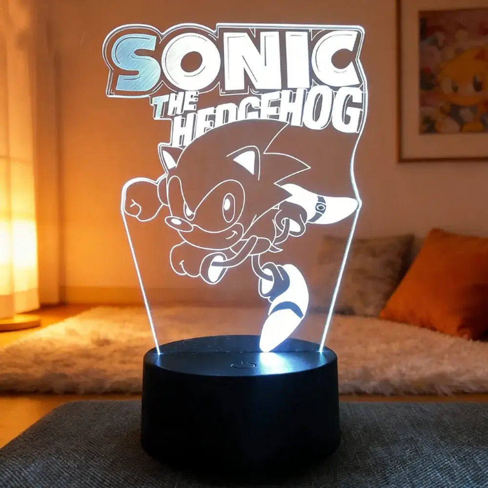A glowing transparent acrylic sonic the hedgehog 3d led night light illuminated with white light on a black base