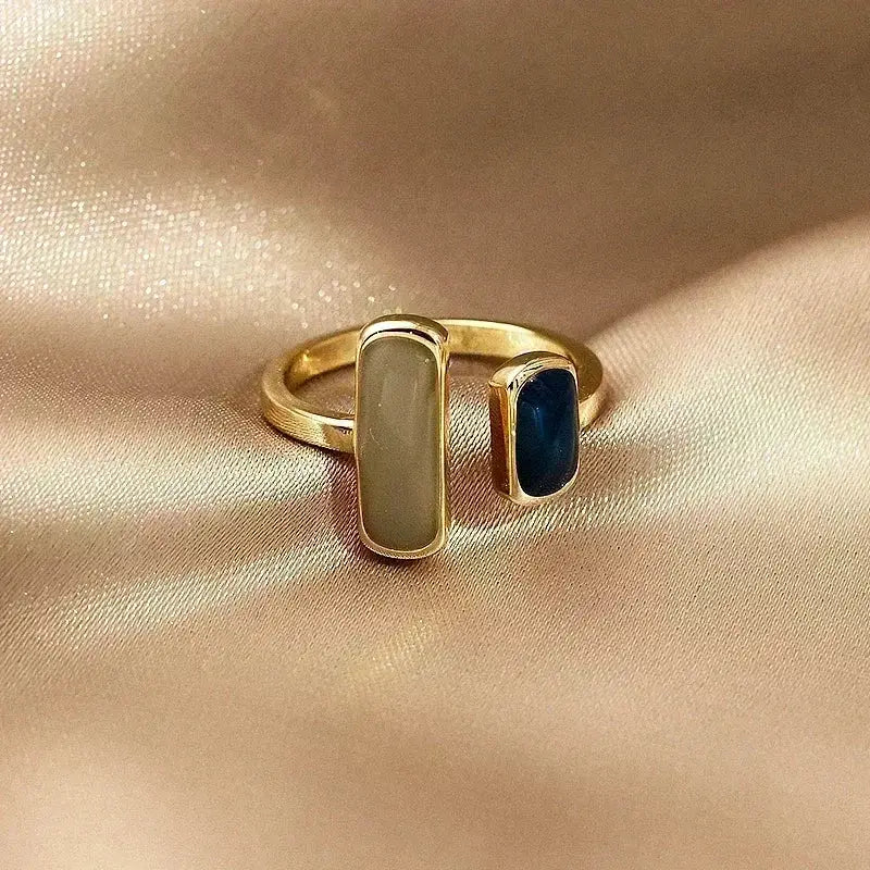 Soul eater kid skull ring gold toned open design with matte beige and deep blue rectangular stones adjustable metal