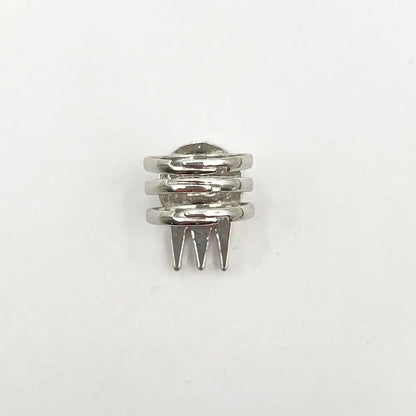 Silver-toned adjustable metal ring with stacked bands and prongs featuring soul eater kid skull design