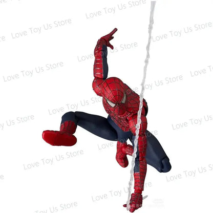 Spider-man tobey maguire action figure mafex no241 in red and blue with highly detailed webbed suit texture in swinging pose