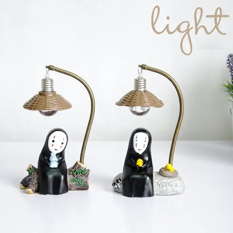 Black resin no-face led desk lamp with woven brown lampshade and flexible brass-colored gooseneck arm for eye protection