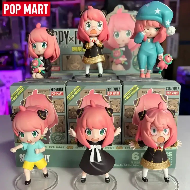 Chibi-style pink-haired spy x family anya blind box figure with detailed painted plastic outfit for desktop collectible