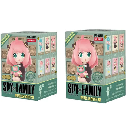Teal and white cardboard spy x family anya blind box featuring chibi pink-haired figure holding plush toy collectible