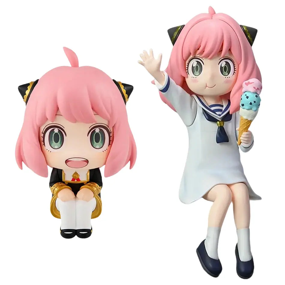 Spy x family anya forger pvc figure featuring two pink-haired anime figurines with green eyes in sailor dress and black uniform