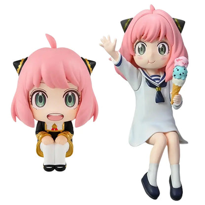 Spy x family anya forger pvc figure featuring two pink-haired anime figurines with green eyes in sailor dress and black uniform