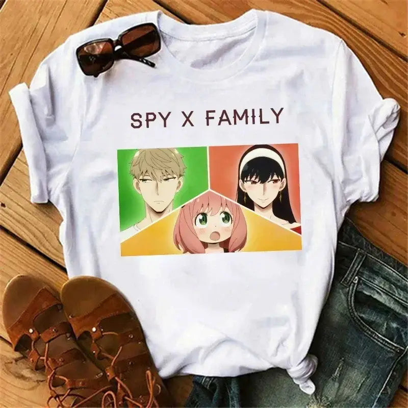 White cotton spy x family t-shirt featuring colorful anya forger graphic with three characters on segmented background