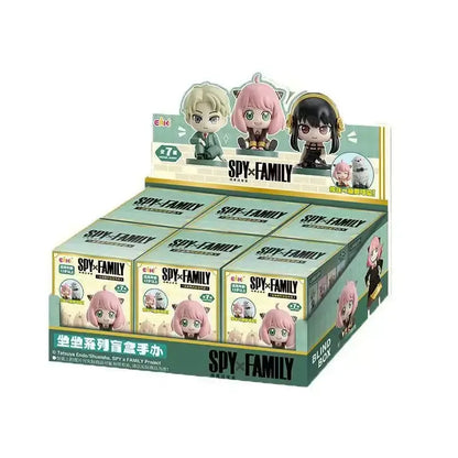 Light green and white spy x family blind box display featuring chibi family anya sitting pvc desktop figure