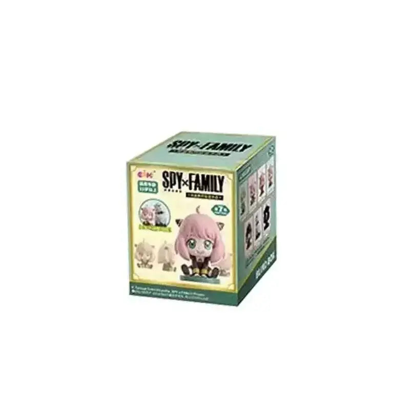 A mint green and cream spy x family blind box featuring a chibi yor forger pvc figure with pink hair and cat ears