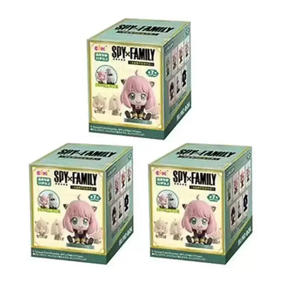 Three spy x family family anya sitting blind box pvc desktop dolls featuring pink hair cat ears and green eyes