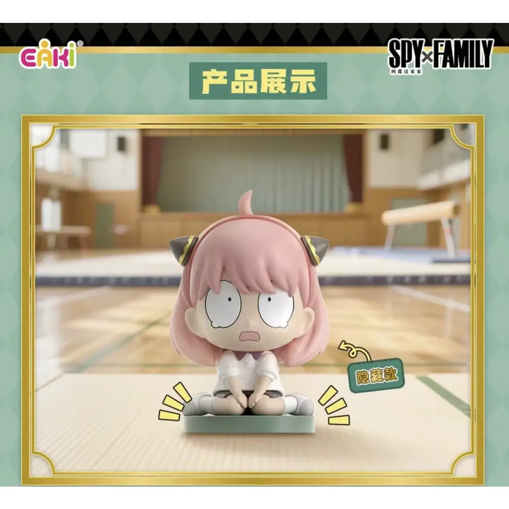 Pink-haired spy x family anya sitting blind box figure with black cat ears and white uniform on green pvc base