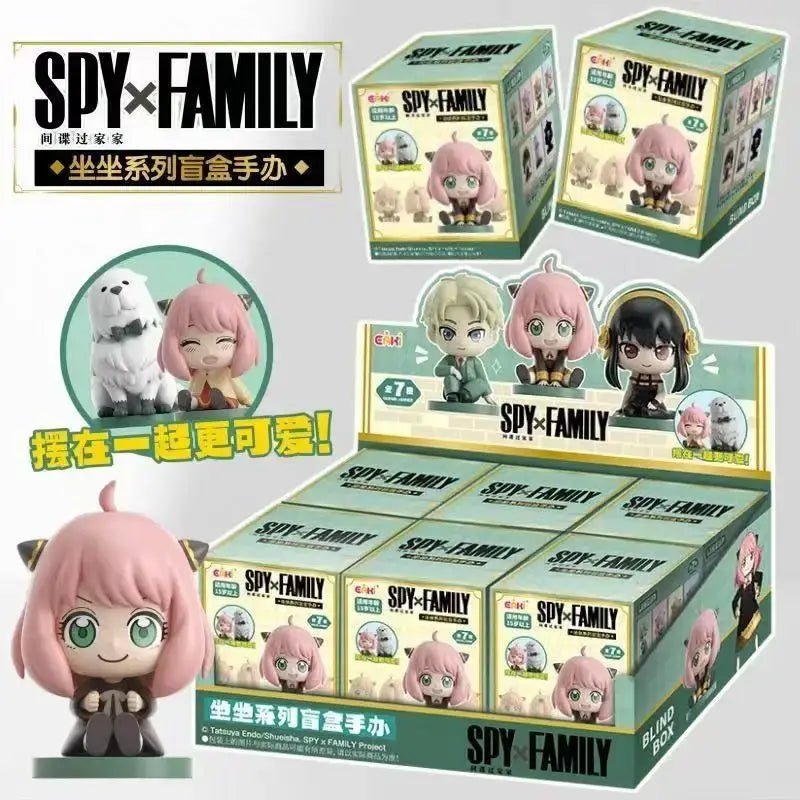 Spy x family family anya sitting blind box figure is a pink-haired chibi pvc desktop doll with green eyes and cat ears
