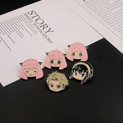 Set of five spy x family yor forger metal badge pins featuring chibi anime faces with pink black and blonde hair alloy brooches