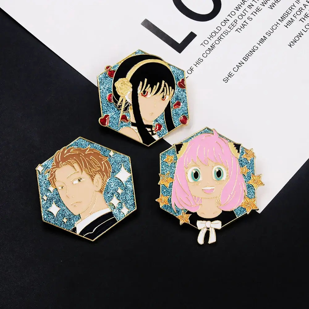 Three hexagonal enamel pins featuring spy x family yor forger with glittery blue backgrounds and gold alloy accents