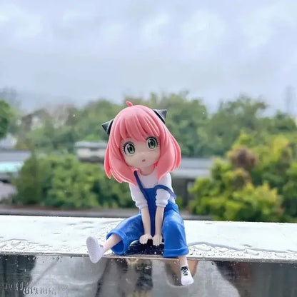 Pink-haired yor forger spy x family pvc figurine with black cat ears wearing blue overalls and white sneakers desktop model