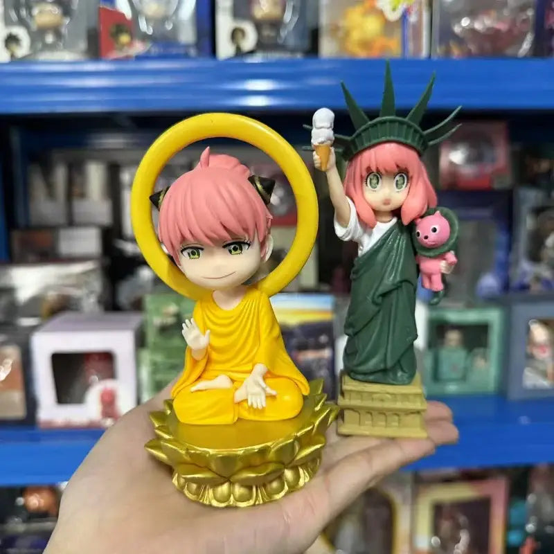 Spy x family yor forger pvc figurine featuring yellow buddha cat ears and pink liberty statue with ice cream cone on lotus base