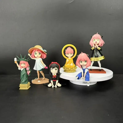 A collection of colorful spy x family yor forger pvc figurines featuring detailed anime-style characters in various outfits