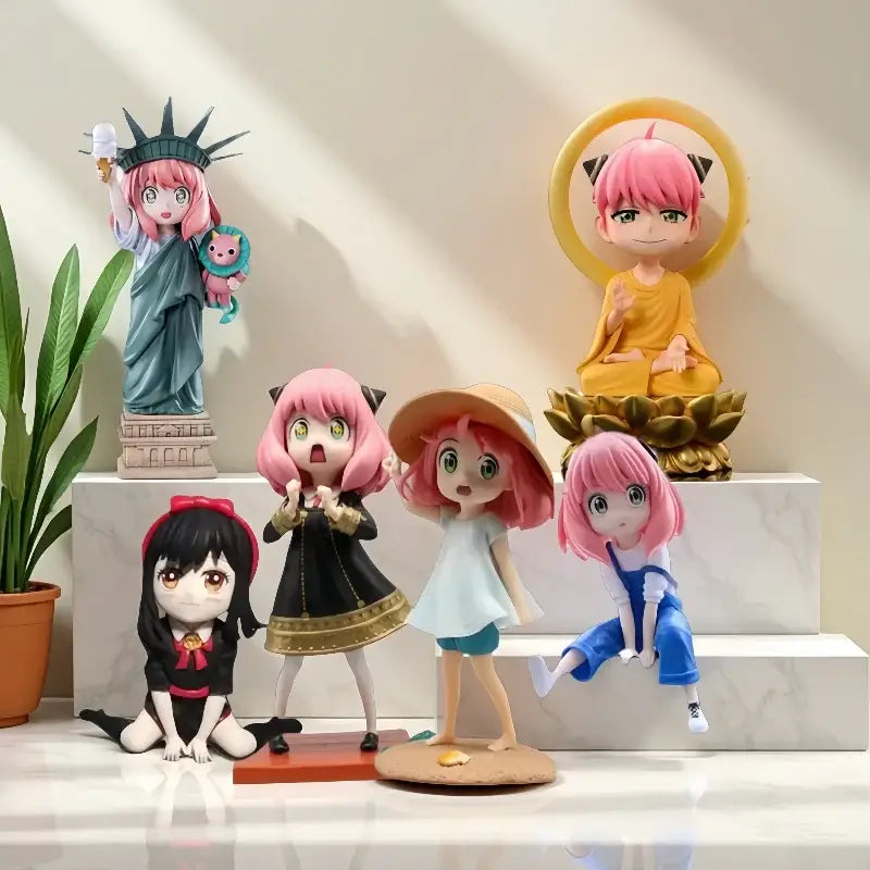 Pink-haired spy x family yor forger pvc figurines in various outfits including statue of liberty with cat companion