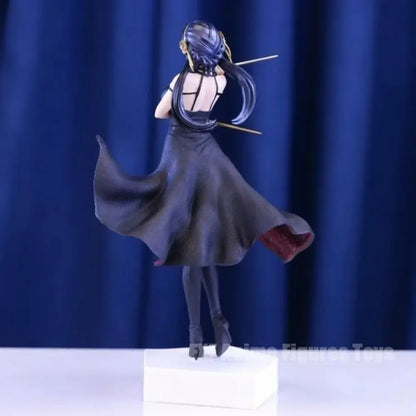 Detailed black and gold spy x family yor forger pvc statue featuring long dark blue hair and elegant backless gown