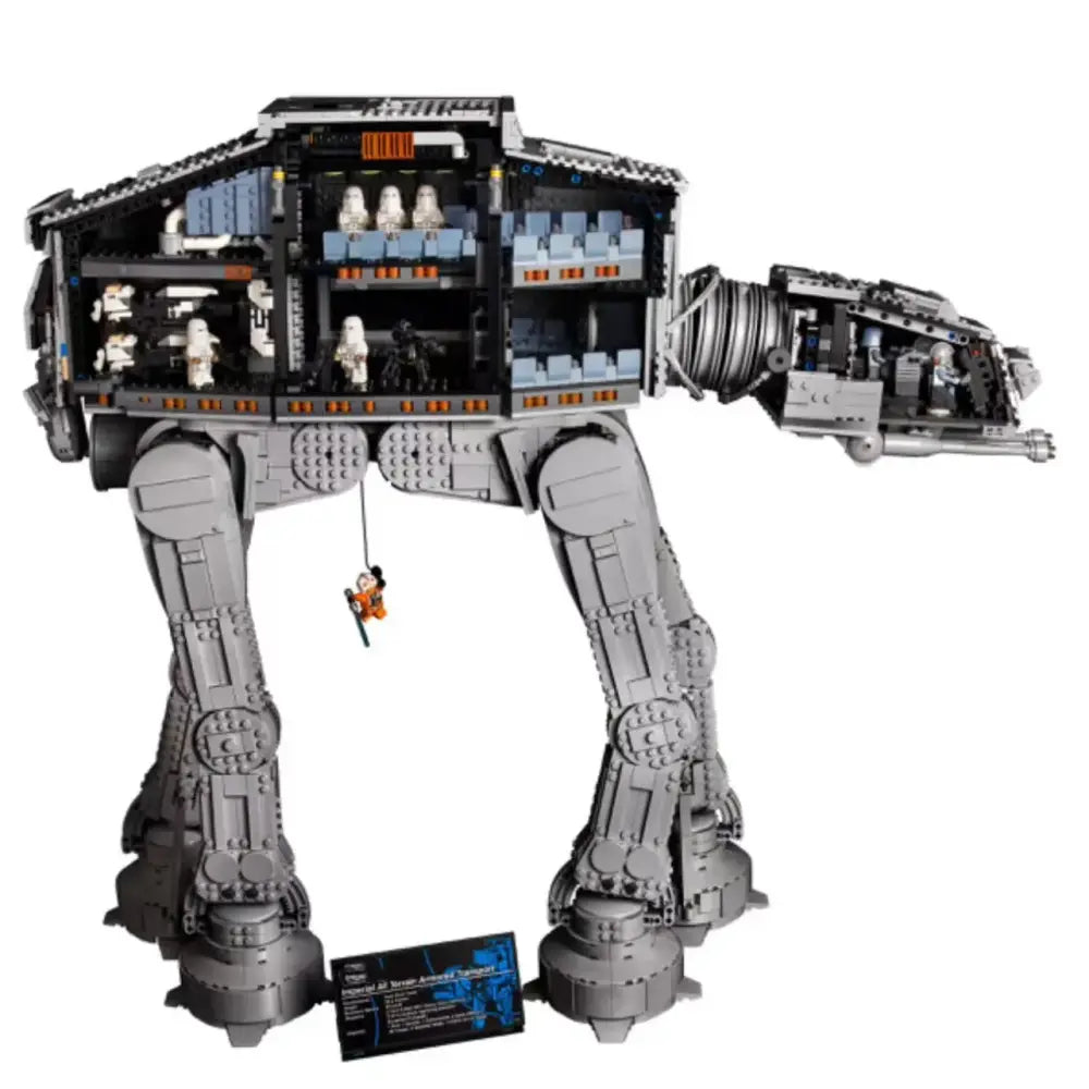 Gray star wars at-at walker building blocks with detailed interior and minifigures in a 6785 piece walker building set