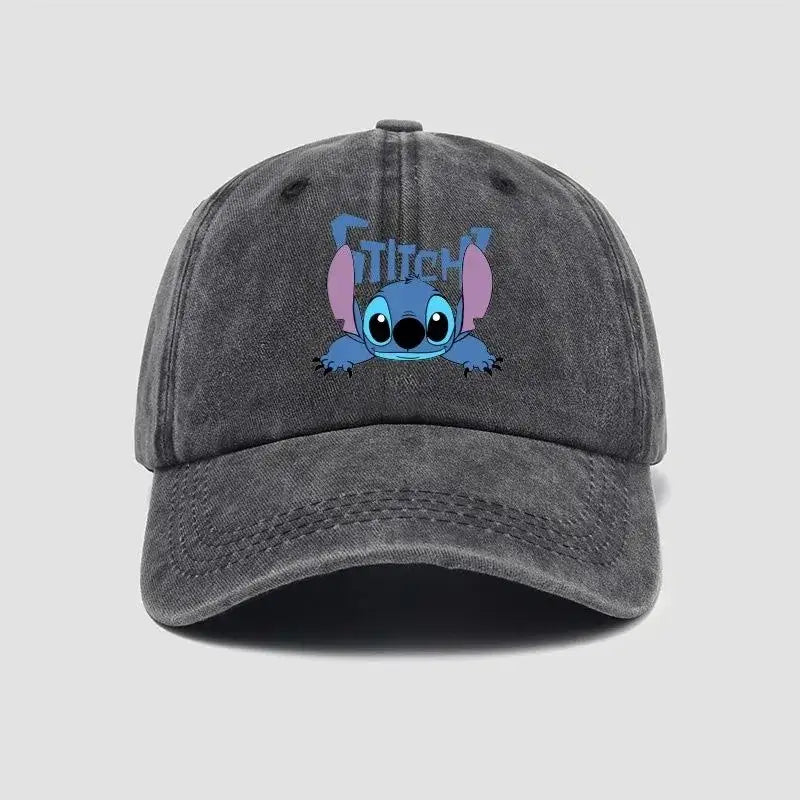 A faded gray denim baseball cap with a breathable adjustable snapback featuring a blue stitch character with pink ears
