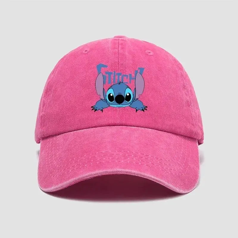 Pink distressed cotton snapback cap with breathable adjustable fit featuring blue stitch character and faded purple lettering