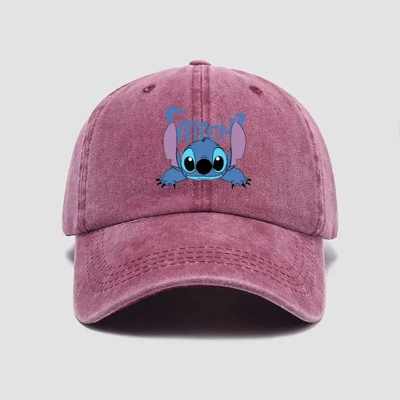 A dusty rose breathable adjustable snapback cap featuring an embroidered blue stitch character on the front