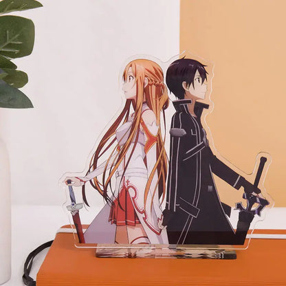 Clear acrylic sword art online acrylic stand featuring asuna and kirito in iconic outfits with swords for desktop decor