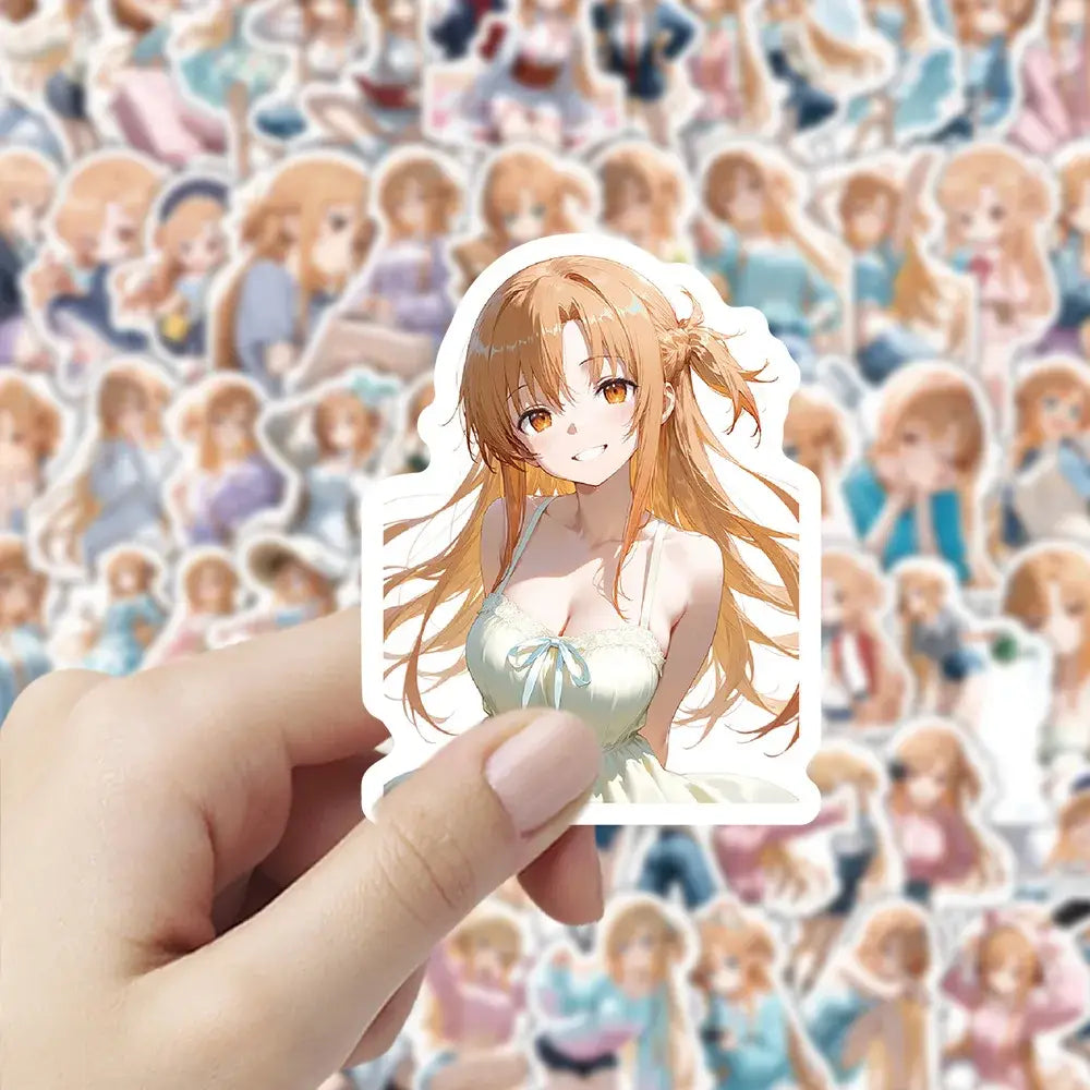 A hand holds a white-bordered sword art online heroine sticker from a waterproof sticker pack featuring an anime girl