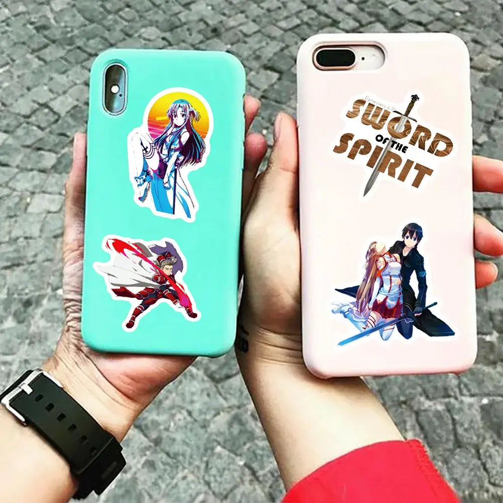 Two smartphone cases one mint green with kirigaya kazuto sticker and one pale pink with sword art online artwork