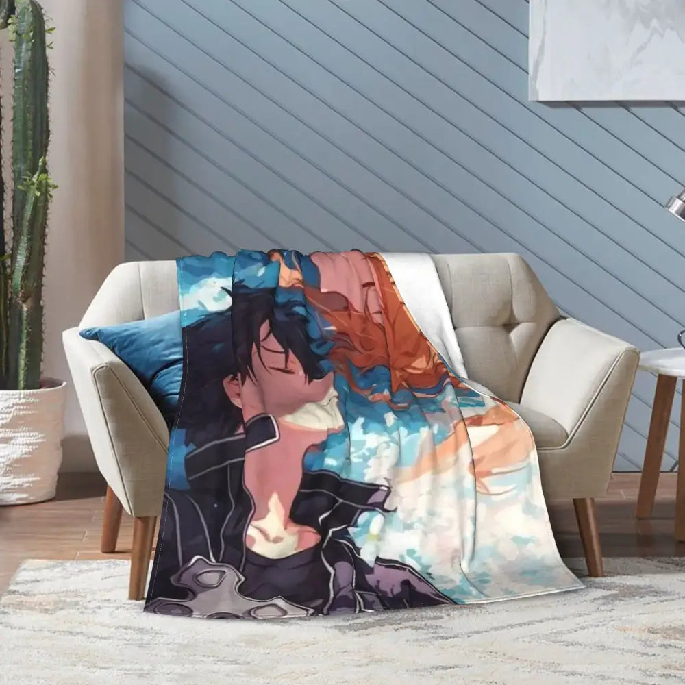 Soft fleece throw blanket featuring vibrant online kirito asuna anime art with swirling blue and orange background