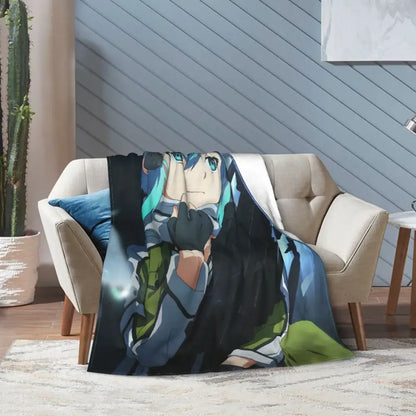Soft fleece throw blanket featuring vibrant art online kirito and asuna with teal hair and blue eyes on cozy fabric