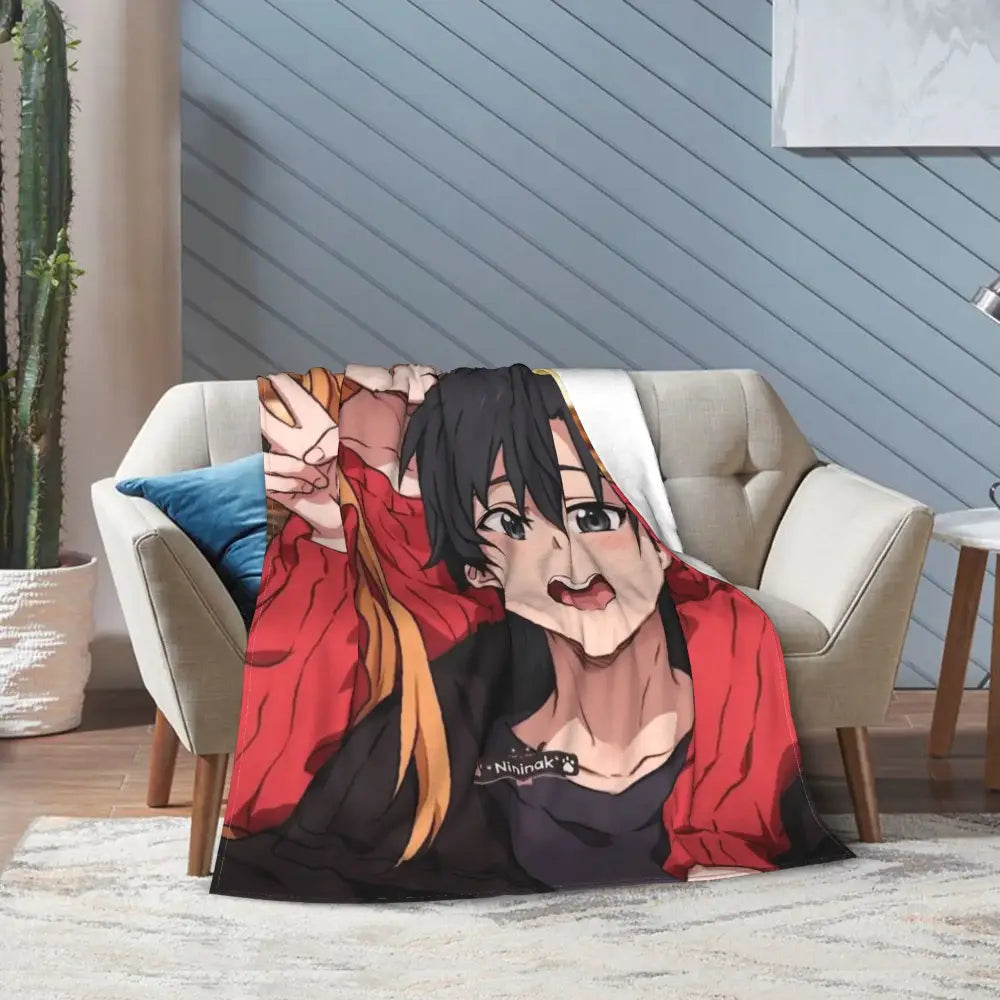 Red and black soft fleece throw blanket featuring a detailed illustration of young man in dynamic pose from art online kirito asuna