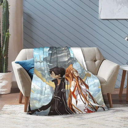 A soft fleece throw blanket featuring art online kirito and asuna draped over a beige sofa for cozy use