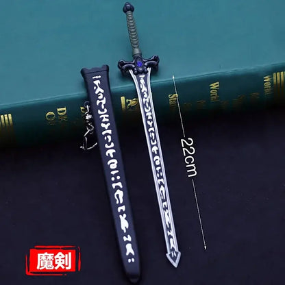 Silver steel kirito elucidator sword keychain with black scabbard intricate white inscriptions and purple hilt gemstone