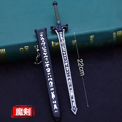 Silver steel kirito elucidator sword keychain with black scabbard white inscriptions and purple gemstone hilt