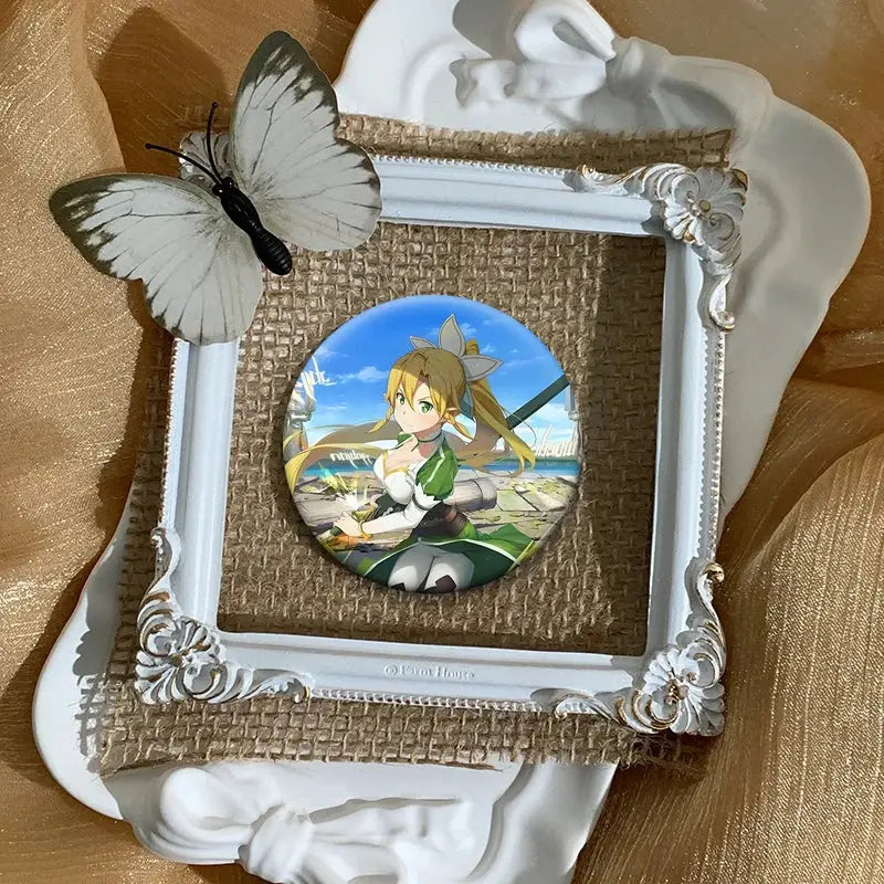 White ornate frame holding a sword art online kirito round anime badge pin with green and gold accents