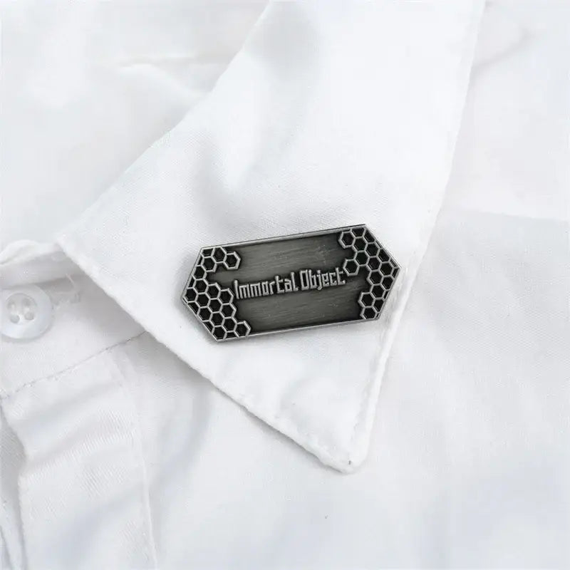 Dark metallic hexagonal sword art online emaille pin with honeycomb pattern and immortal object engraving vintage badge