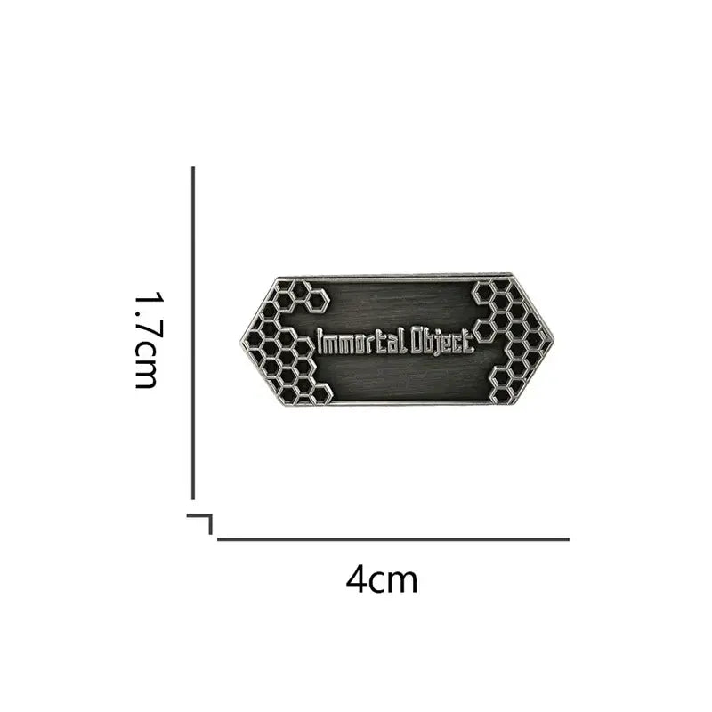 A sleek hexagonal sword art online emaille pin with dark brushed metal and honeycomb patterns for vintage badge fans