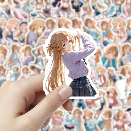 A hand holds a white-bordered vinyl decal sticker of yuuki asuna in a lavender sweater from sword art online graffiti