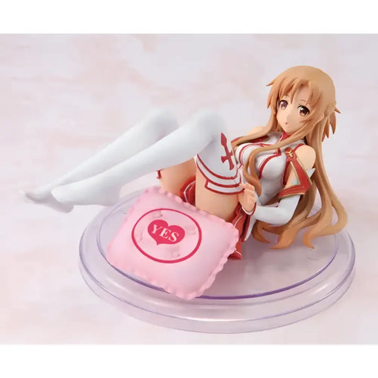 Pink pillow with red yes emblem and heart design beside sword art online yuuki asuna pvc figure 1/8 scale