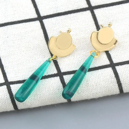 Gold-toned crescent moon maomao drop earrings with translucent teal teardrop pendants from apothecary diaries cosplay jewelry