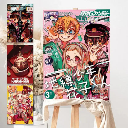 Pink magazine cover of toilet bound hanako-kun poster featuring three vibrant anime characters in detailed illustrations