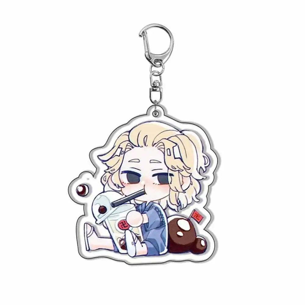 Chibi-style tokyo revengers acrylic keychain featuring a blonde character in blue sipping a red and white drink cup with brown plush figures