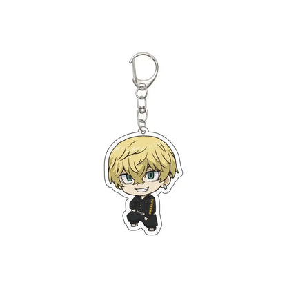 Chibi-style tokyo revengers acrylic keychain featuring a blonde character with green eyes in a black gold uniform