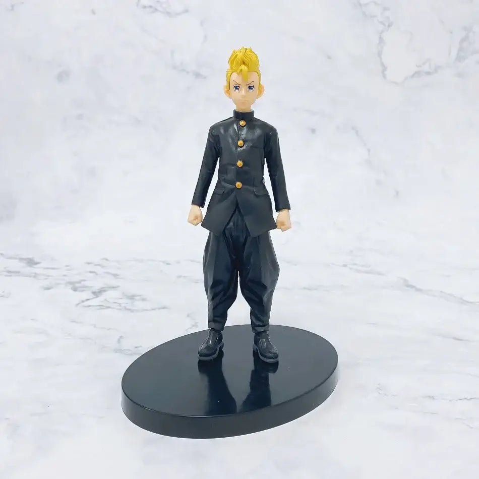 Black pvc figure of tokyo revengers hanagaki keisuke hanma with spiky blonde hair in uniform on circular base from figure set