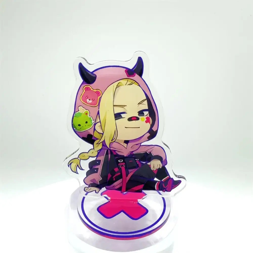 A clear acrylic tokyo revengers manjiro stand featuring a chibi blonde character in a pink hoodie with black horns
